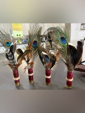 One Peacock & Mixed Feather Boutonniere with Shotgun Shell Base (variety shown)